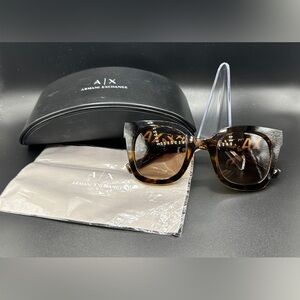 Armani Exchange Sunglass with holder and wipes.